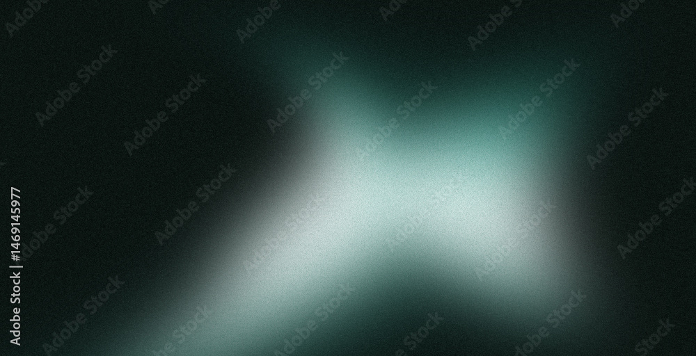 Fototapeta premium Abstract blurred teal and white shapes on dark background.