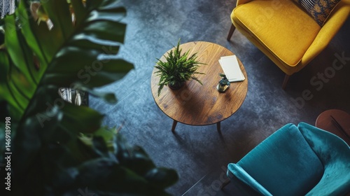 Obraz na płótnie Top view of round modern table with chairs and plants in interior decor layout for home inspiration w salonie
