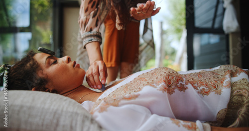 Ritual, inner peace and woman with healer, hands and meditation for self awareness, spiritual and smoke. Ceremony, chakra and holistic for soul with gemstone, zen and awakening of person with shaman