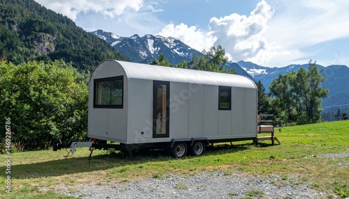 Modern Trailer Home Surrounded by Scenic Mountain Landscape