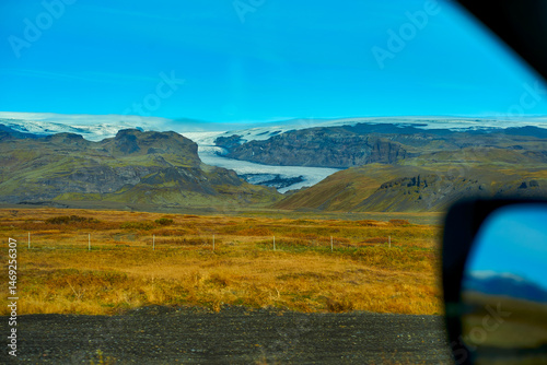Iceland glacier view outside of the car window while driving for roadtrip in Iceland.