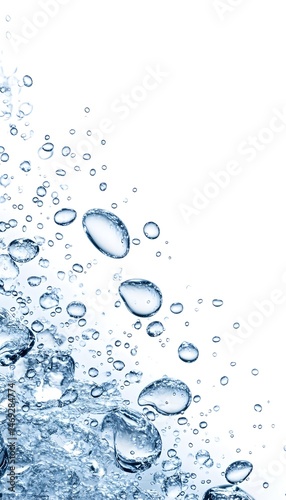 Close-up of water droplets and bubbles rising against a white background
