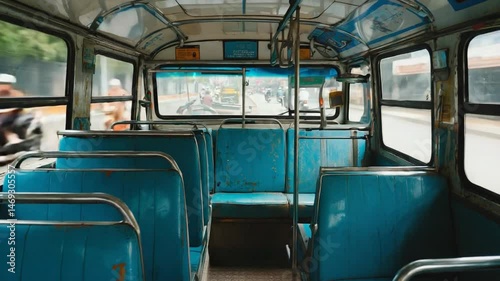 Empty bus interior with blue seats. photo