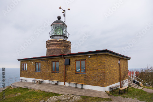 Historic lighthouse building on the coast of Kullen, Sweden.