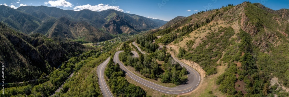 Stunning Aerial View of a Winding Switchback Road Through Lush Mountains in Mid-Afternoon Light Generative AI