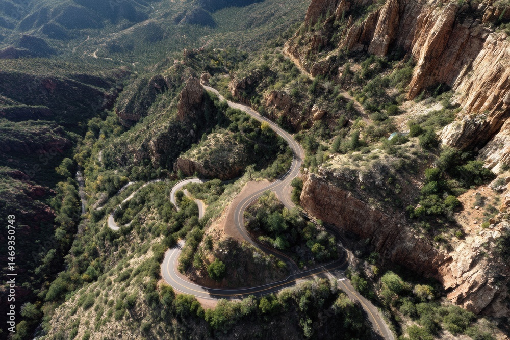 Aerial View of Winding Switchback Road Navigating Through a Mountainous Landscape in Clear Weather Generative AI