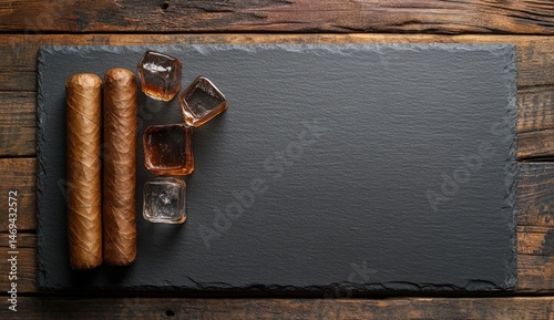 Dark stone slab with cigars and ice