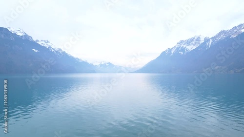 Wallpaper Mural A view of the Brienz lake in Winter with the swiss Alps in the background. Brienz, Switzerland - February 10, 2025.  Torontodigital.ca