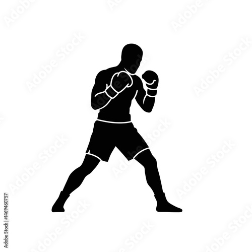 Alert Boxer Silhouette Standing in a Defensive Fighting Stance With Gloves Held High