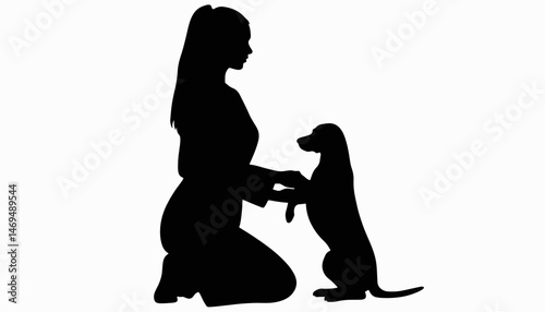 Silhouette of female veterinarian interacting with a dog, compassion