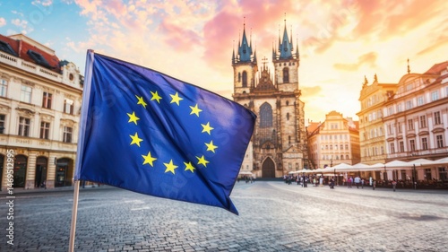 European Union Flag Waving in Front of Historic Cathedral
