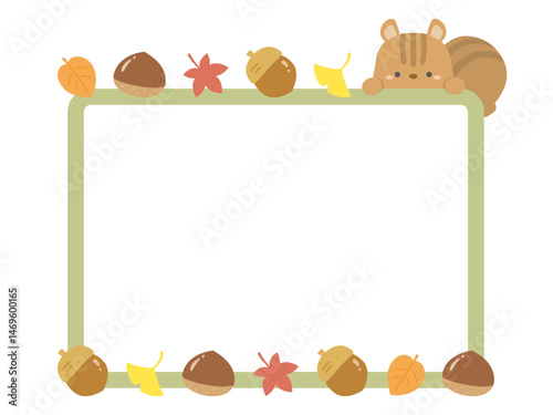 秋のフレーム、紅葉した葉と木の実とリス