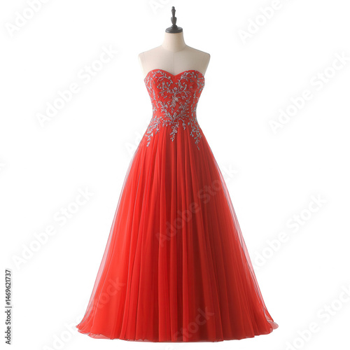 Elegant red evening gown with intricate silver embellishments, showcased on a dress form against a clean white background for a striking visual appeal.