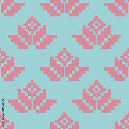 a pattern composed of pixel designs with pink flowers on light blue background , design for fabric or various pattern printing works.