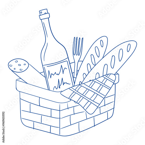 Picnic basket with wine, bread, and utensils ready for outdoor enjoyment on a sunny day