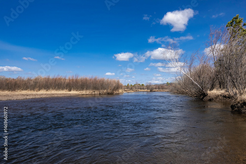 Fast flowing river in spring. Siberia