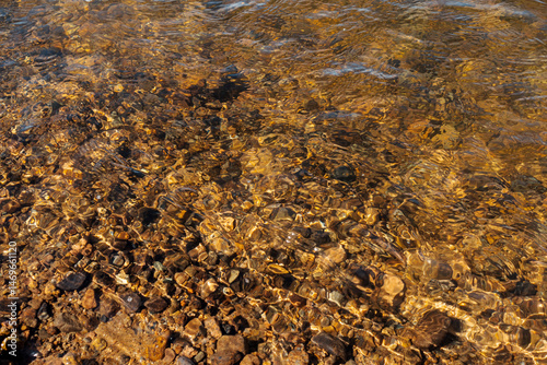 sandy and pebbles bottom of a freshwater river