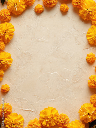 onam ornaments pookolam and marigold garland with empty beige blank space
