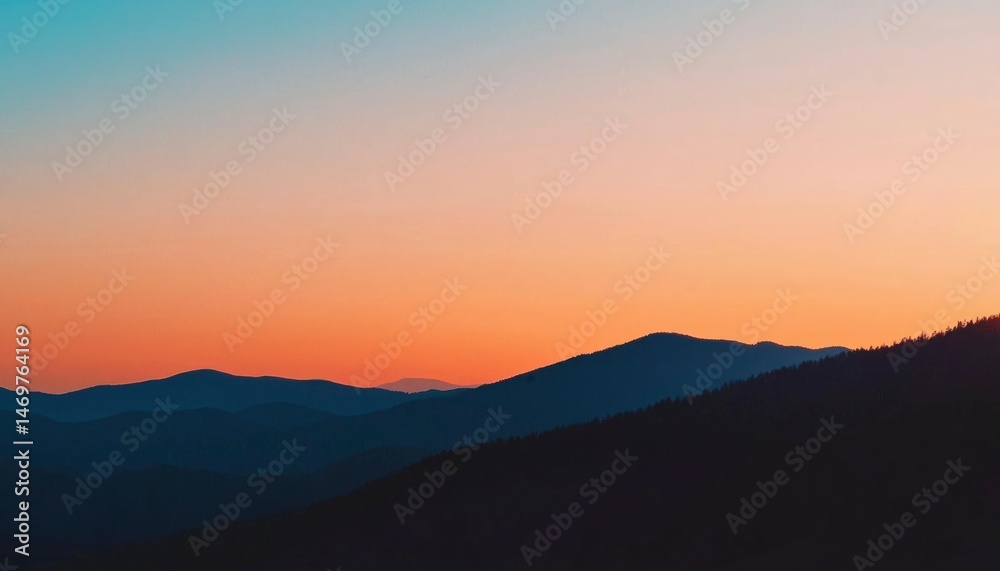 Obraz premium Sunset over mountain range