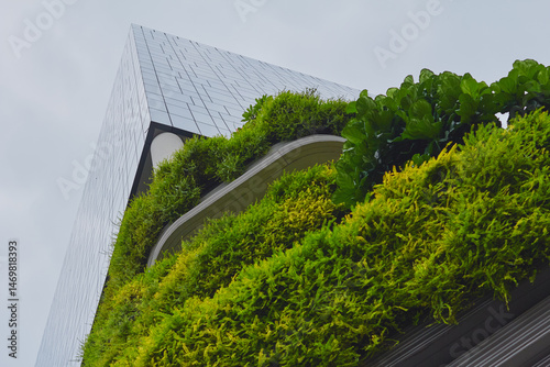 Photography Modern architectural structure with lush greenery in urban setting captures sust