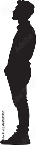 Male Silhouette Standing: A strong and evocative silhouette of a man standing, his posture suggesting contemplation or quiet strength.  The image offers a sense of mystery and introspection.