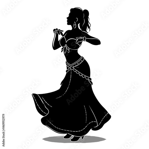 Silhouette of a belly dancer gracefully moving in traditional attire - Concept of grace, femininity, east  