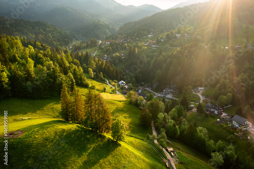 Calm idyllic village in Slovenian mountains at sunrise, summer travel concept