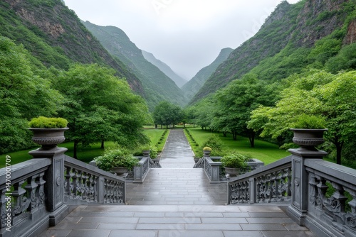 A view from the temple steps down into a valley covered in morning mist photo