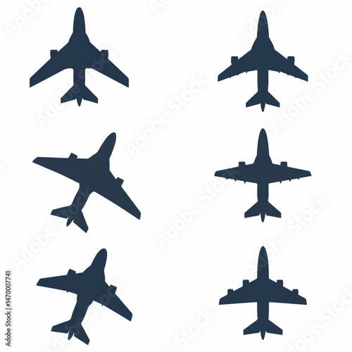 Airplanes Silhouette: High-angle shot of various airplane silhouettes against a plain backdrop, providing a clean visual representation of air travel and aviation. 