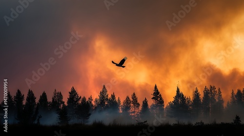 Bird Flying Over Smoky Forest With Raging Wildfire and Burning Trees