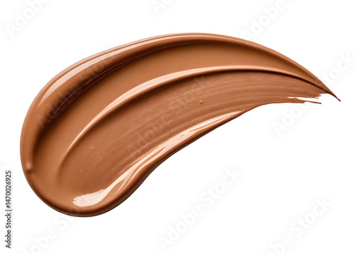 Swatch of brown foundation makeup cream on black background with glossy texture