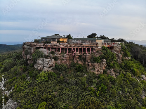 Devil's Table Ayvalik, Türkiye from above. Stone hill with a built observation deck and cafes on it. created by dji camera 