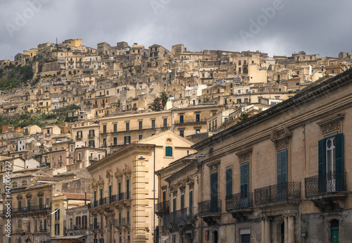 Historic Architecture Frames the Hillside of Modica in Sicily on a Cloudy Day, Italy