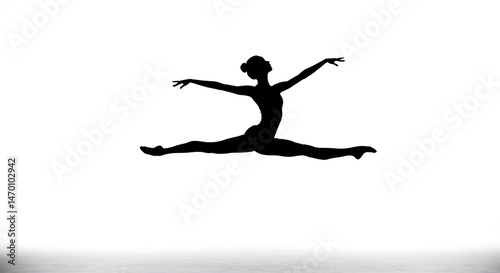Dynamic silhouette of female athlete performing split jump exercise
