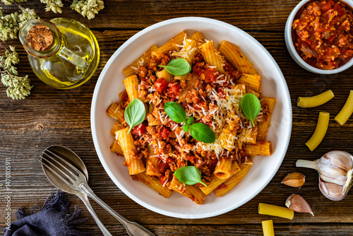 Quadro su tela Rigatoni con ragù alla bolognese - noodles with bolognese sauce and grated parme
