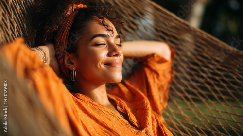 A woman is laying in a hammock