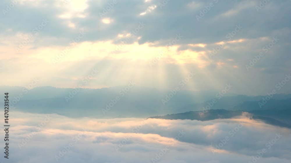 Mountain clouds illuminate with shimmering skylight in captivating timelapse Mountain clouds illuminate with shimmering skylight in captivating timelapse