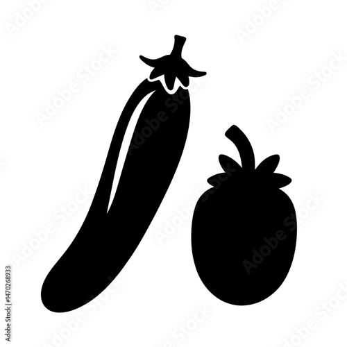 Silhouette of an eggplant and a tomato creating a simple food illustration