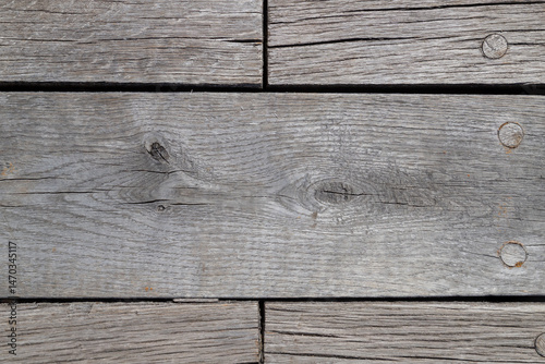 Obraz na płótnie Close-Up of Weathered Wooden Planks with Natural Texture and Grain Details w salonie