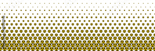 horizontal halftone of black and yellow radioactive sign on white for pattern and background.