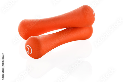 Two orange rubberized dumbbells isolated on white background. Sports equipment. Full depth of field.