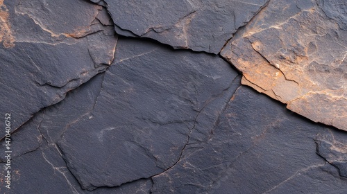 Dark Grey and Brown Cracked Rock Texture Background
