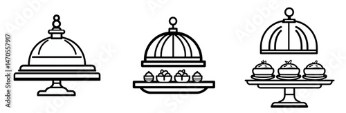 Elegant serving dishes with cloches arranged on display for a culinary event or gathering
