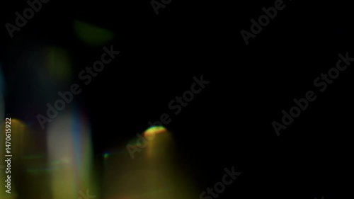 4K Lens flare and bokeh overlay on black background, abstract elegant light effects, transition overlay, high-quality organic footage lightleak, leak, flare for screen mode, optical rays.