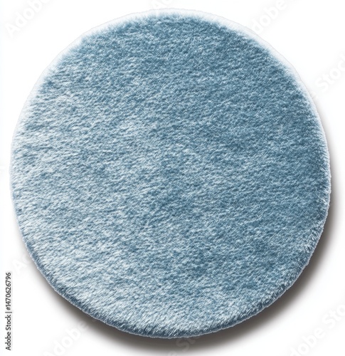 Round, light-blue fuzzy rug