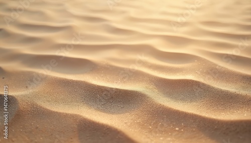 Soft brown sand texture with gentle ripples. Natural warm tone and soft lighting. Ideal for backgrounds, travel, vacation themes. Perfect for beach, desert, sea and ocean concepts. photo