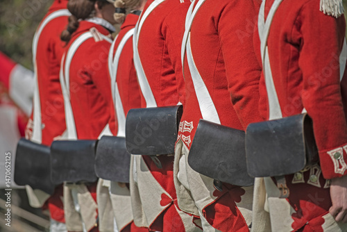 British forces line up in formation ready for battle plans during a Revolutionary war reenactment