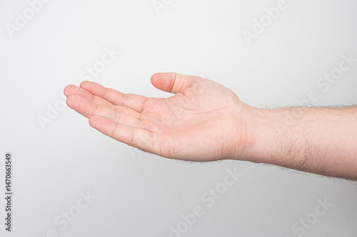 Light-skinned arm in motion, bent elbow, no background objects, realistic style, soft shadows, natural lighting.