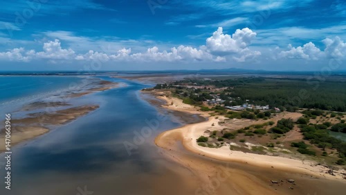 Wallpaper Mural Panoramic aerial view of the blue river against sandy beach merging with green forest and beautiful cloudy sky, nature landscape Torontodigital.ca