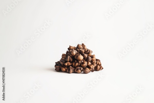 Pile of dark-brown, textured snacks